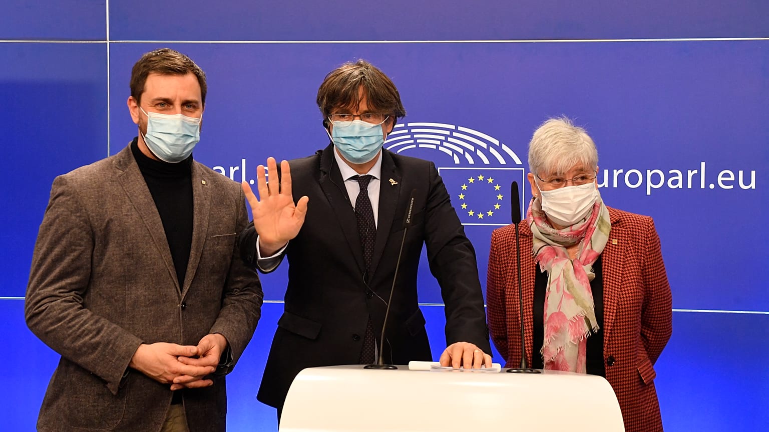 Exiled former Catalan leaders and MEPs (from L) Antoni Comín, Carles Puigdemont and Clara Ponsatí give a press conference at the EU Parliament in Brussels, March 9, 2021.