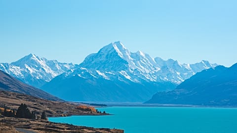 The instantly recognisable clear, blue waters and breath-taking mountains of New Zealand.