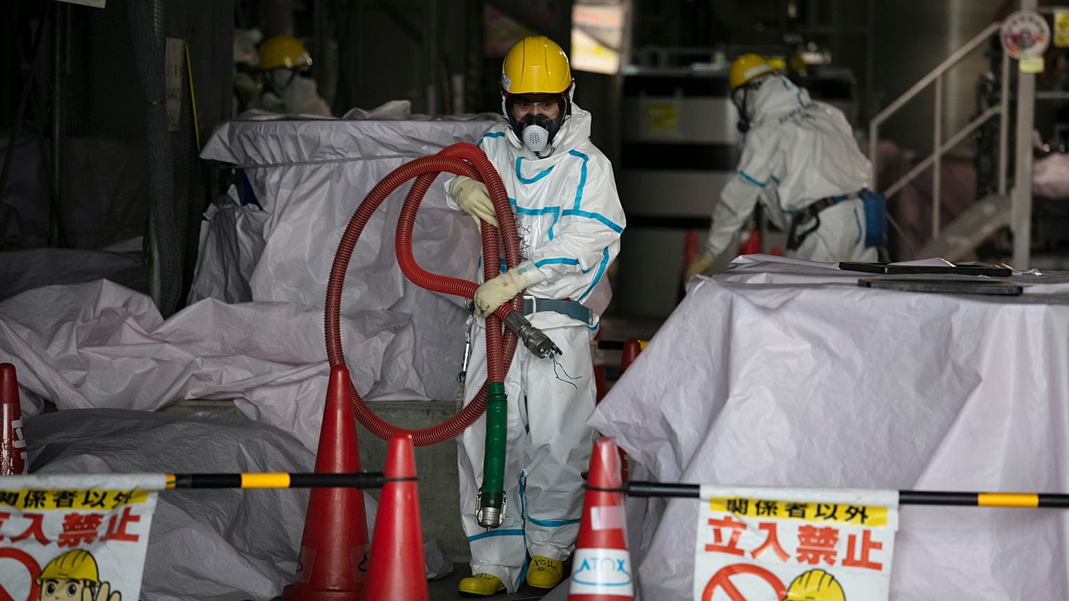 Archive image of a worker at a water treatment facility at the Fukushima nuclear power plant, Japan