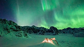 Aurora borealis over Sheldon Chalet, Denali National Park, Alaska, USA