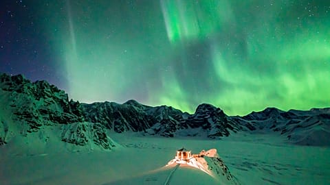 Aurora borealis over Sheldon Chalet, Denali National Park, Alaska, USA