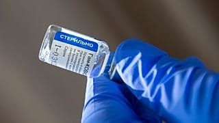 A health worker prepares to administer a shot of the Russian vaccine Sputnik V in Zalaegerszeg, Hungary.