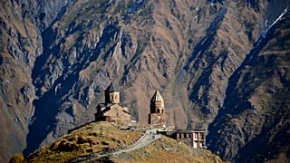 4th century Gergeti church in the village of Stepantsminda (former Kazbegi) close to Russian-Georgian border, some 160 km north of the capital Tbilisi.