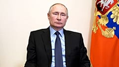 Russian President Vladimir Putin chairs a Security Council meeting via video conference at the Novo-Ogaryovo residence outside Moscow, Russia, Friday, March 12, 2021.