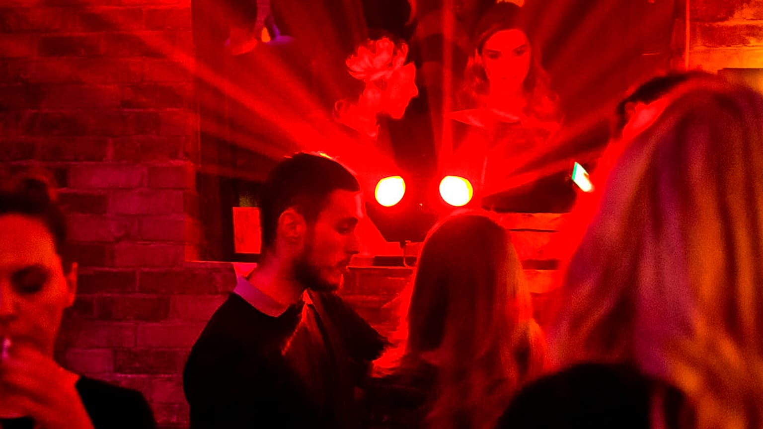 A young couple is seen on their night out in capital Pristina