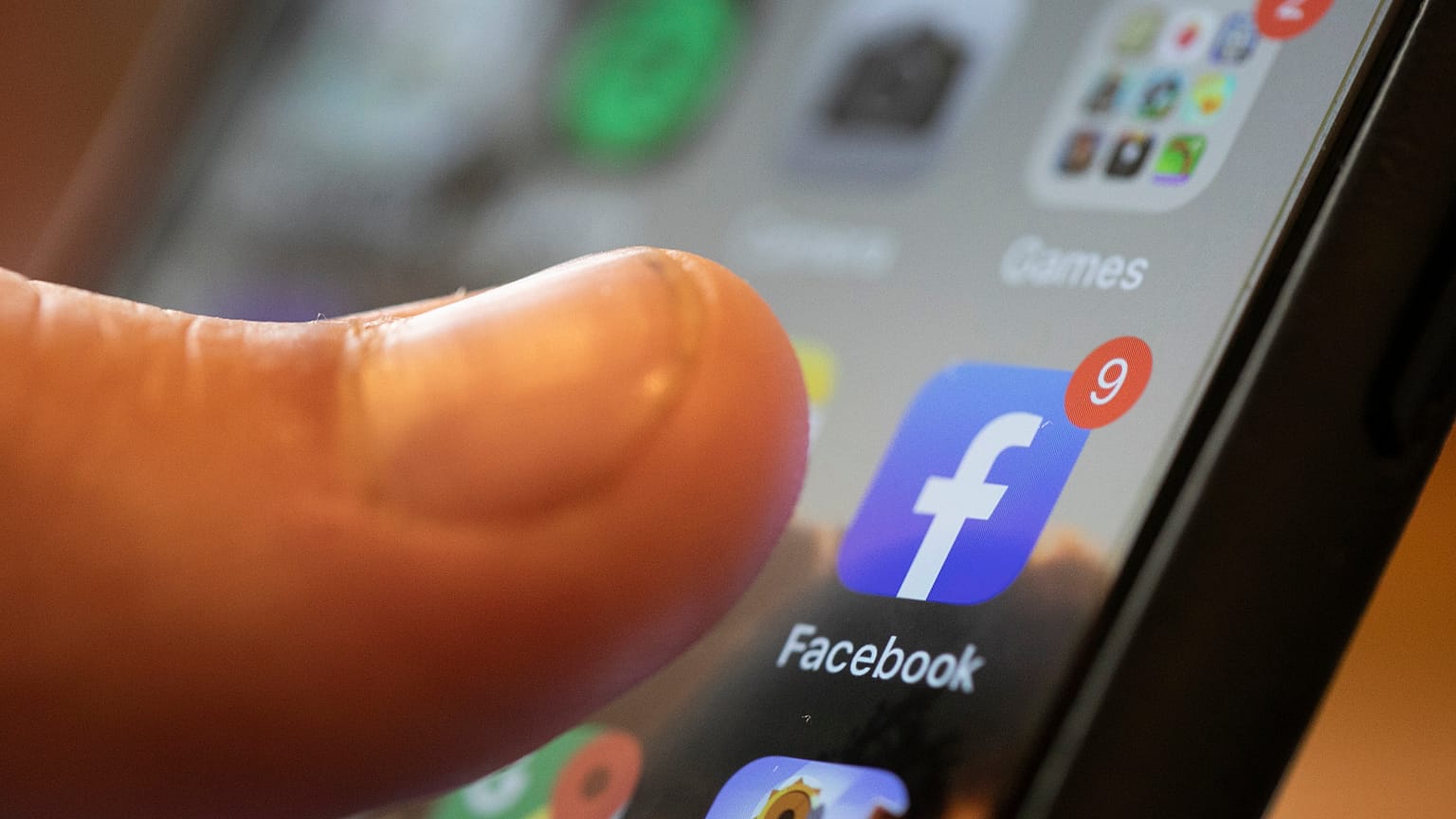  Aug. 11, 2019, file photo, an iPhone displays the Facebook. 