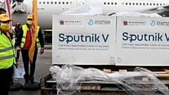 Boxes loaded with the Russian Sputnik V COVID-19 vaccine arrive at Tunis airport, Tuesday, March 9, 2021
