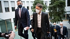 German Health Minister Jens Spahn (L) arrives for a news conference on March 19, 2021 in Berlin, amid the novel coronavirus / COVID-19 pandemic.