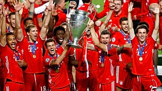 Munich players lift the trophy after Munich won the Champions League final soccer match between Paris Saint-Germain and Bayern Munich at the Luz stadium in Lisbon,