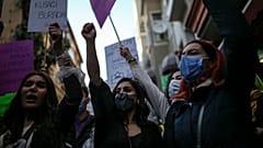 FILE - In this Monday, March 8, 2021, photo, protesters chant slogans during a rally to mark International Women's Day in Istanbul. 
