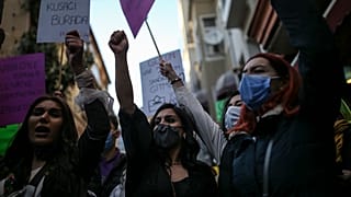FILE - In this Monday, March 8, 2021, photo, protesters chant slogans during a rally to mark International Women's Day in Istanbul. 
