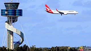 FILE: A Qantas jet prepares to land at Sydney Airport in Sydney, Oct. 31, 2011. 