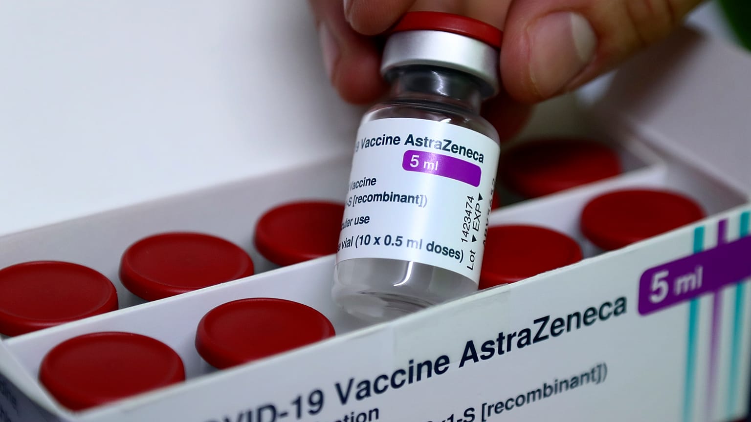 Medical staff show AstraZeneca coronavirus vaccine during preparations at the Vaccine Village in Ebersberg near Munich, Germany, Friday, March 19, 2021. 
