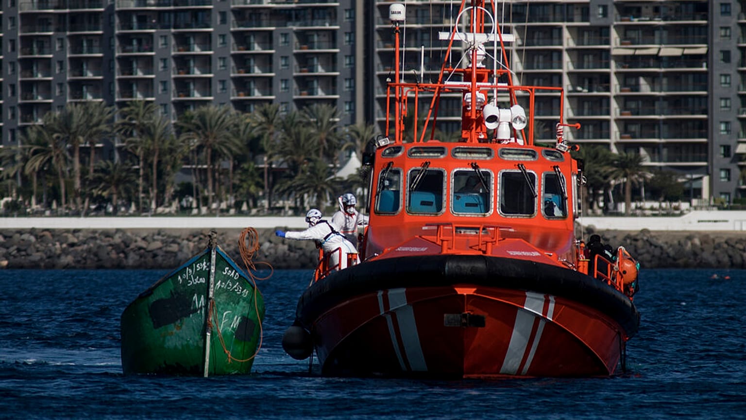 Spanish coastguards arrive in Arguineguin carrying migrants after their rescue in Gran Canaria island, Spain on Wednesday Nov. 25, 2020. 