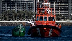 Spanish coastguards arrive in Arguineguin carrying migrants after their rescue in Gran Canaria island, Spain on Wednesday Nov. 25, 2020. 
