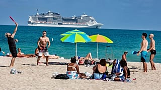 Beach goers enjoy the beautiful weather at the beach, Wednesday, March 2, 2021 in Miami Beach