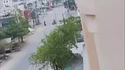 Motorcyclist shot off his motorbike by police in Myanmar