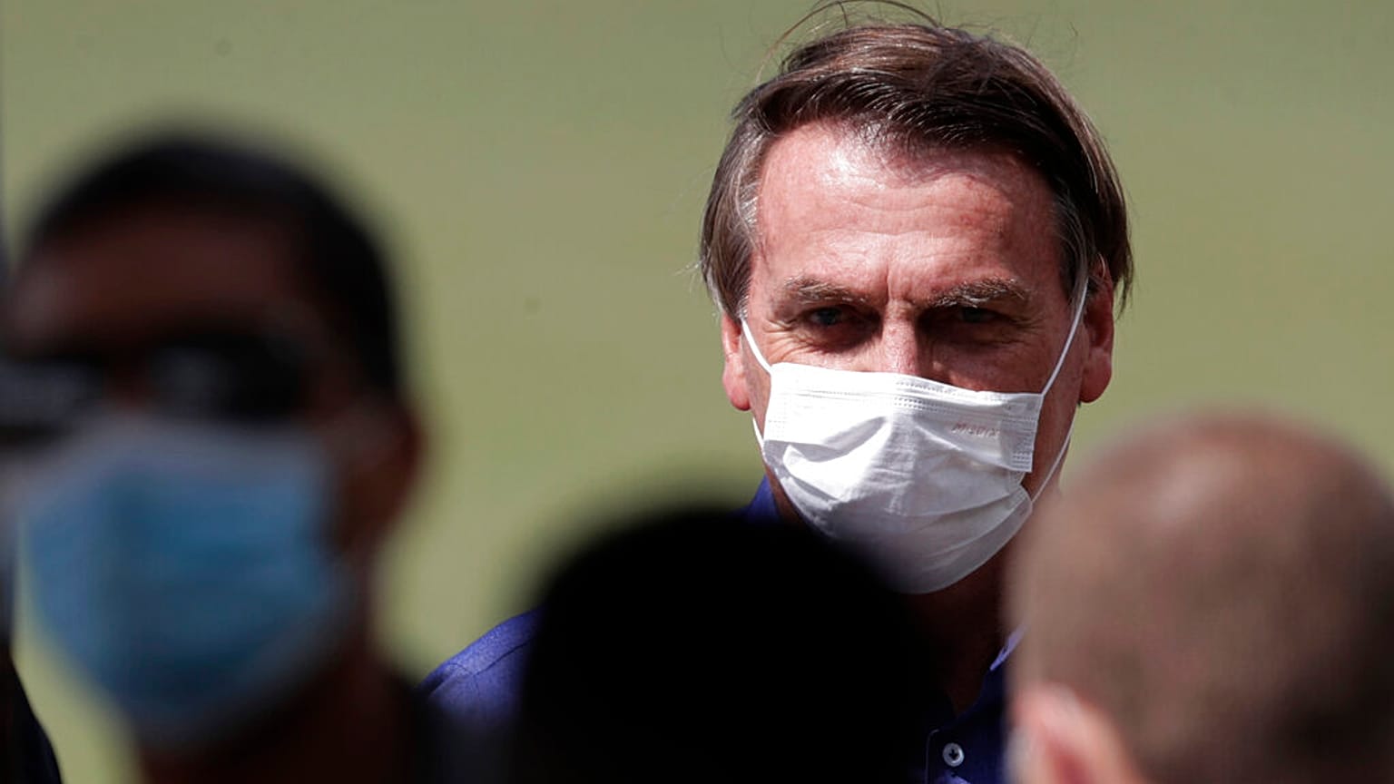 Brazil's President Jair Bolsonaro celebrates his 66th birthday with supporters at the Alvorada Palace