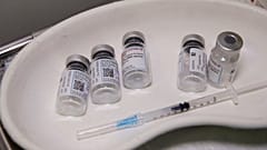 Vials of the AstraZeneca vaccine are pictured at the Fondazione Martino Zanchi nursing home, in Alzano Lombardo, Italy. March 22, 2021.