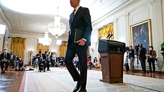 President Joe Biden walks off after a news conference in the East Room of the White House, Thursday, March 25, 2021, in Washington.