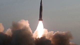 This photo from North Korea's government shows what it says a test fire of newly developed new-type tactical guided projectile, North Korea, March 25, 2021.