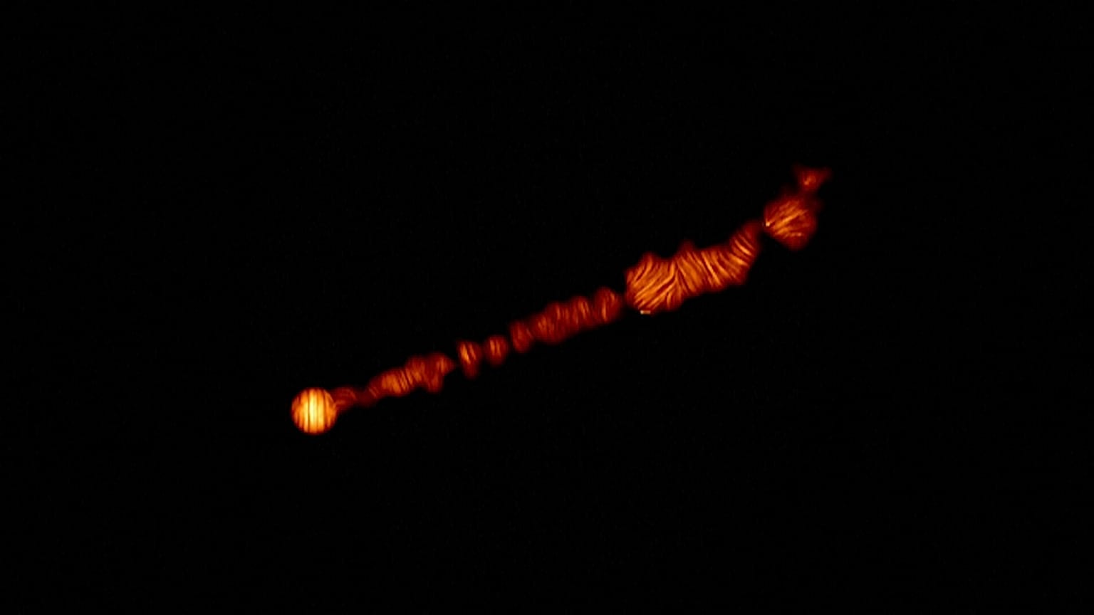 Jets des Schwarzen Lochs M87 in polarisiertem Licht