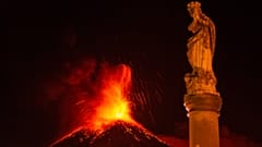 Lava erupts from Mt. Etna volcano during its sixteenth eruption since the volcanic activity started in February. Fornazzo, Sicily, Italy. March 24, 2021