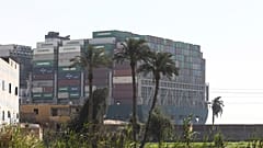 Ever Given, a Panama-flagged cargo ship, that is wedged across the Suez Canal and blocking traffic in the vital waterway is seen Saturday, March 27, 2021.
