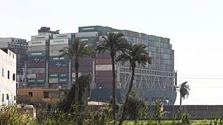 Ever Given, a Panama-flagged cargo ship, that is wedged across the Suez Canal and blocking traffic in the vital waterway is seen Saturday, March 27, 2021.