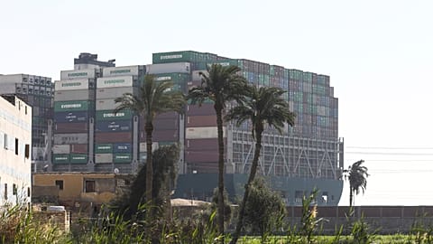 Ever Given, a Panama-flagged cargo ship, that is wedged across the Suez Canal and blocking traffic in the vital waterway is seen Saturday, March 27, 2021.