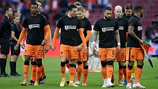 Netherlands' players enters on the field with shirts reading 'Football Supports Change' prior to the start of the World Cup 2022 qualifier vs Latvia on March 27, 2021.