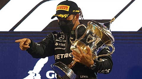 World champion Lewis Hamilton holds off Verstappen to win a tense season-opening Bahrain Grand Prix