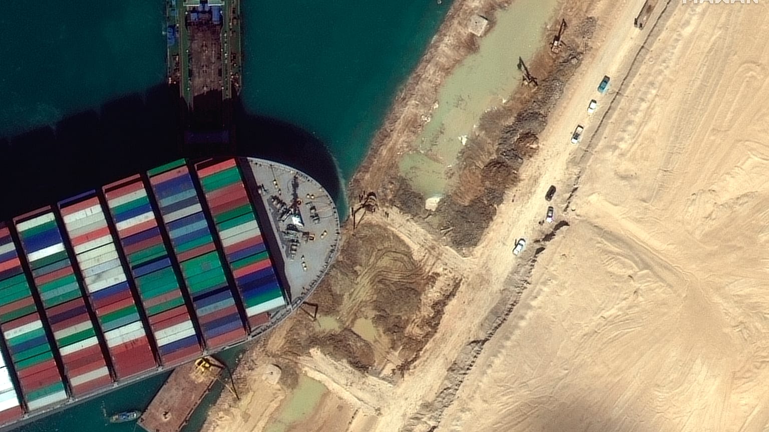 This satellite image from Maxar Technologies shows the cargo ship MV Ever Given stuck in the Suez Canal near Suez, Egypt, Saturday, March 27, 2021.