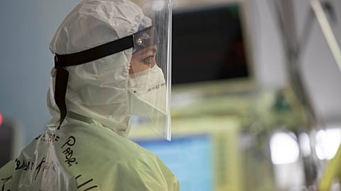 A nurse looks at a monitor in the COVID Intensive Care Unit of the San Filippo Neri hospital in Rome, Friday, March 19, 2021.