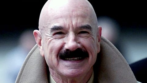  This Jan. 16, 2001, file photo shows G. Gordon Liddy, a Watergate conspirator, arriving at Baltimore's federal courthouse. 