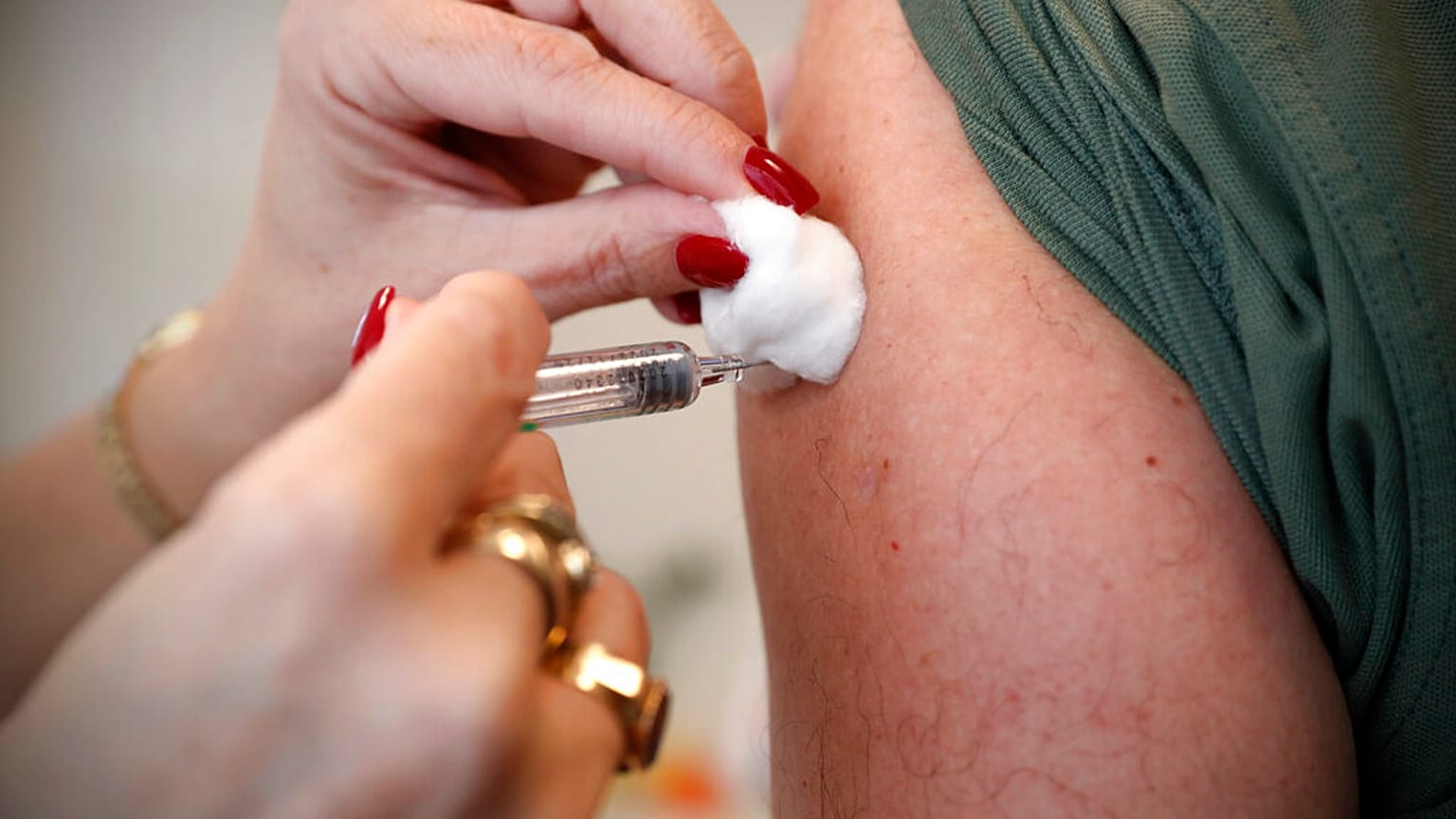 Hungarian man receives a shot of Sinopharm COVID-19 vaccine in Budapest, Feb. 24, 2021.