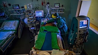 FILE: Examination of a Covid 19-patient at Szent Laszlo hospital in Budapest, April 22, 2020