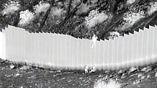 Smugglers drop children over US border barrier