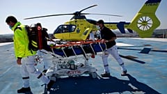 Medical workers bring an emergency arrival on the rooftop of the Amiens Picardie hospital, March 30, 2021 in Amiens, France.