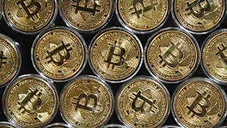 A physical imitation of a Bitcoin at a crypto currency "Bitcoin Change" shop, near Grand Bazaar, in Istanbul.