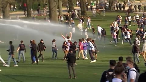Police use water cannon to disperse crowd in Brussels