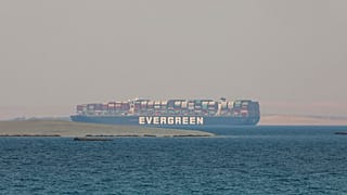 FILE: Ever Given, a Panama-flagged cargo ship, is seen in Egypt's Great Bitter Lake Tuesday, March 30, 2021. 