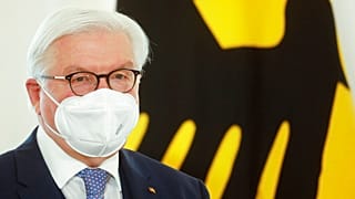 FILE: German President Frank Walter Steinmeier attends a ceremony to honour people for their services during the coronavirus pandemic, Friday, March 26, 2021. 
