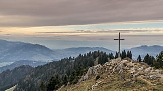 A cross on a hill in Hochhädrich, Austria
