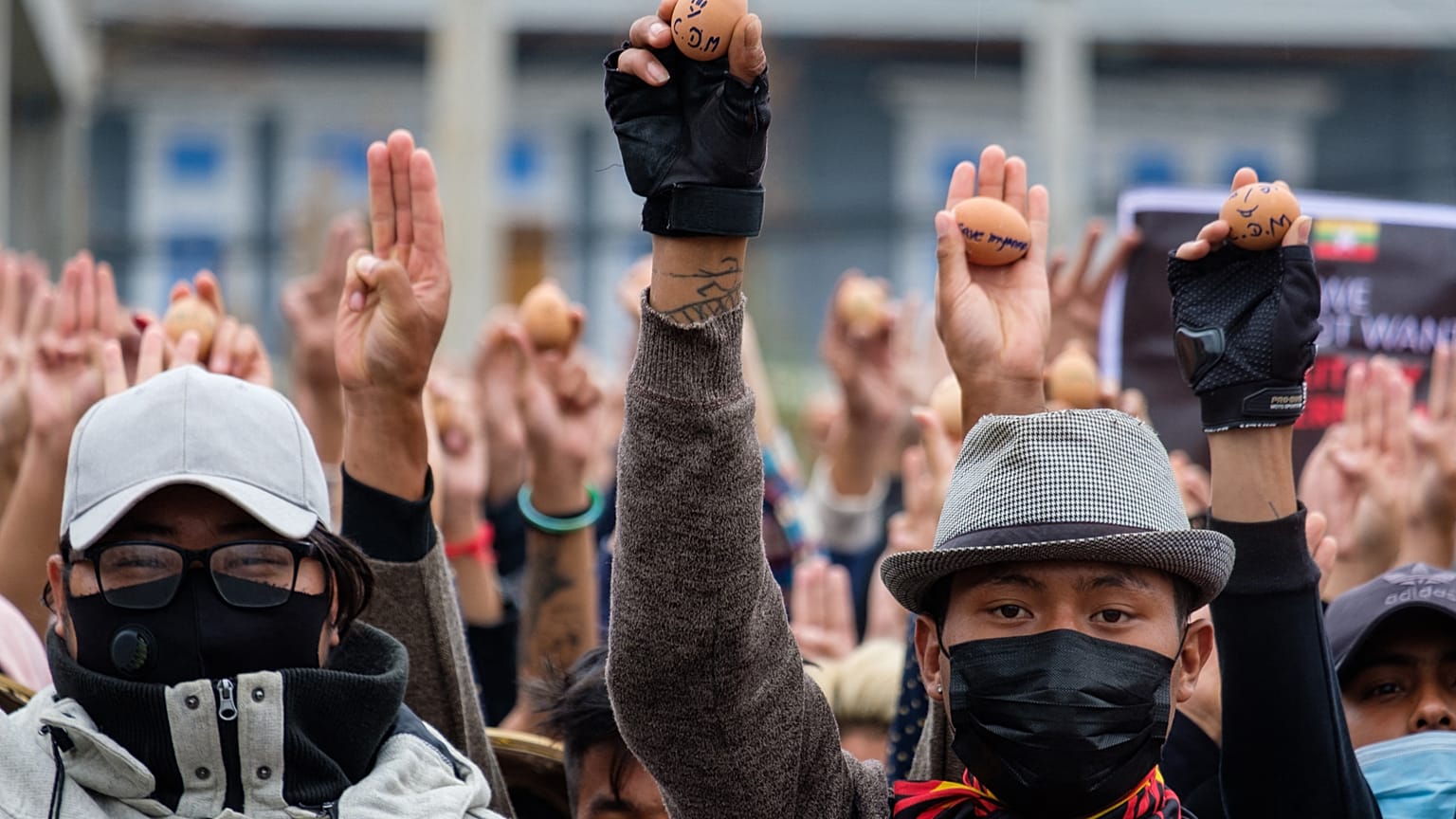 Protesters holding eggs to coincide with Easter Sunday during a demonstration against the military coup in Myanmar