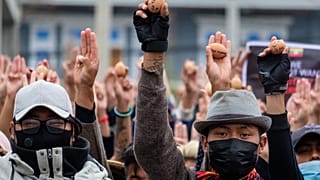 Protesters holding eggs to coincide with Easter Sunday during a demonstration against the military coup in Myanmar