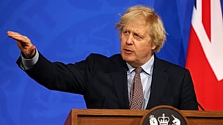 Britain's Prime Minister Boris Johnson speaks during a media briefing on COVID-19 from Downing Street's media briefing room in London - March 29, 2021