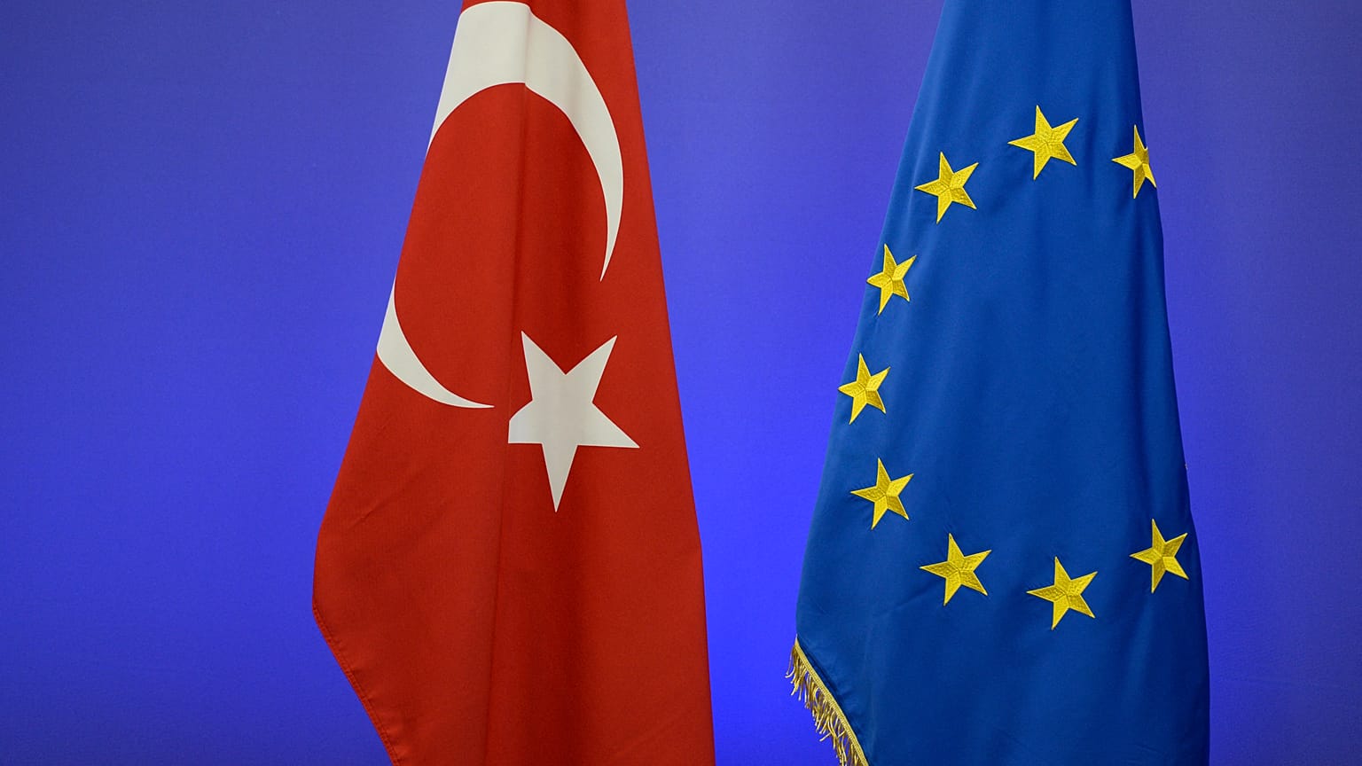 An archive image of  the Turkish national flag and the EU flag 