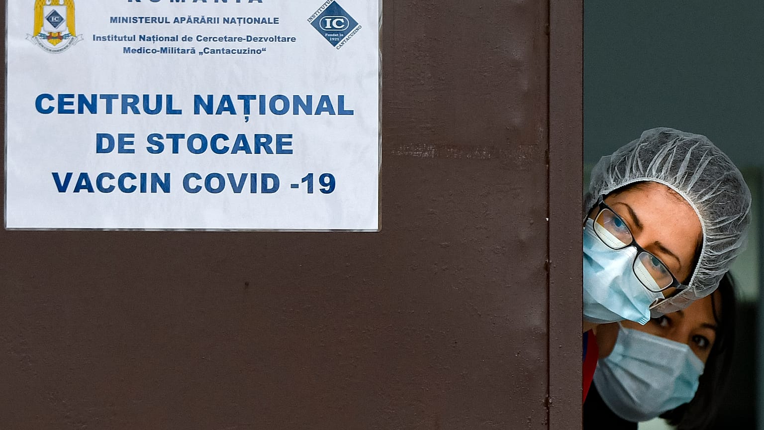Medical staff at the National Center for Storage of the COVID-19 Vaccine, a military run facility, in Bucharest, Romania in December 2020.