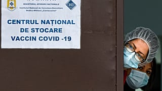 Medical staff at the National Center for Storage of the COVID-19 Vaccine, a military run facility, in Bucharest, Romania in December 2020.